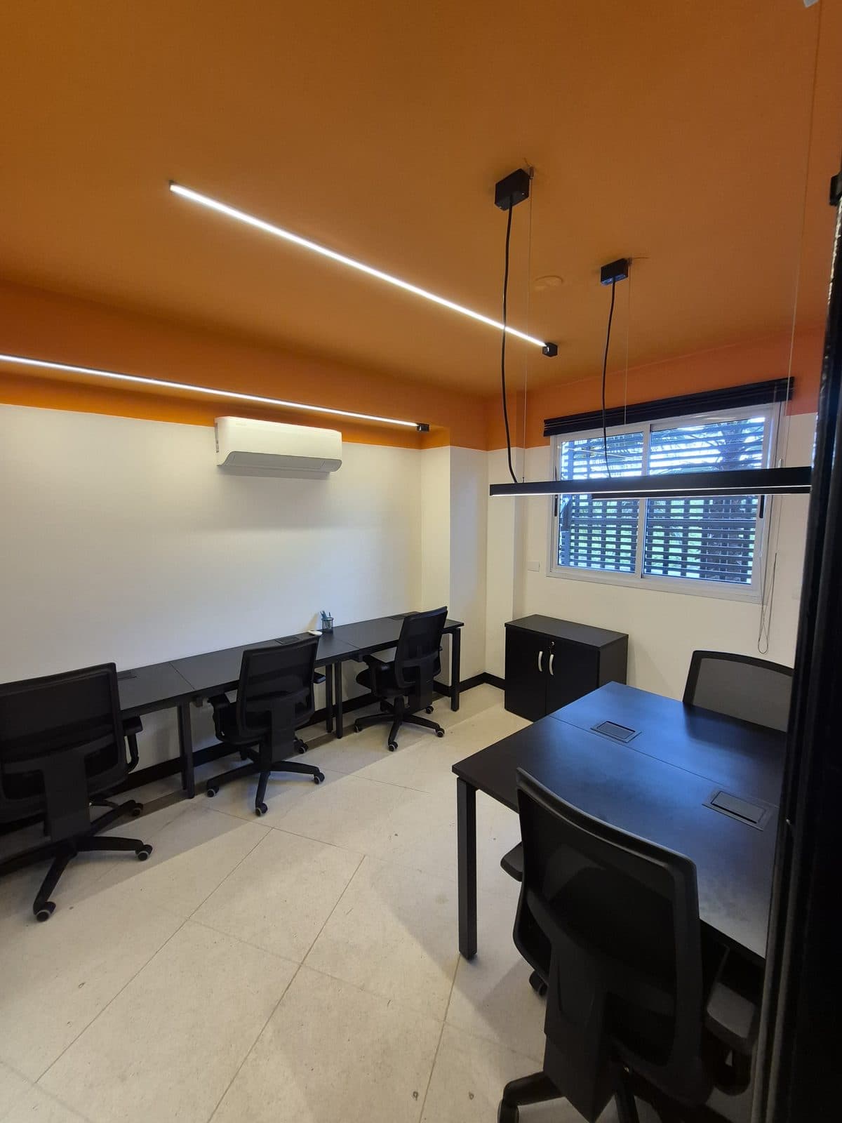 Sala privativa mobiliada do Brains Parque Barigui, em Curitiba
